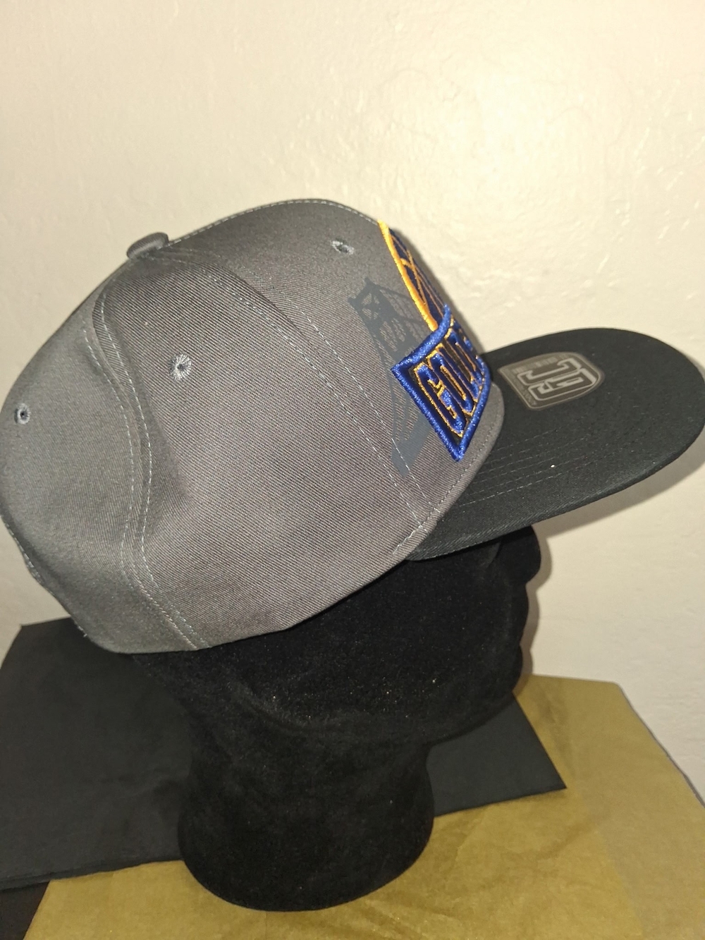 Men's Gray and Black Embroidered Snapback Hat with Blue and Yellow Accents